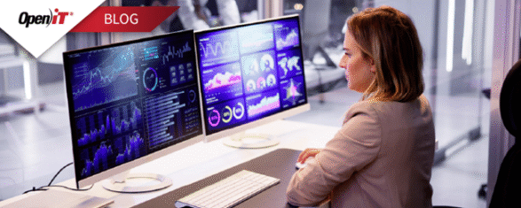 a professional woman monitors dual screens displaying software dashboards and analytics, representing FinOps strategies for IT cost optimization and software asset management in a modern office setting.
