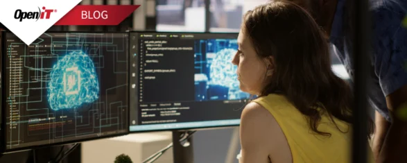 a professional analyzing digital data and ai-driven visualizations on a dual-monitor setup. represents open it’s software asset manager solutions for optimizing license usage, ensuring compliance, and managing software assets across hybrid it environments.