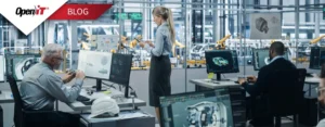 engineers in a high-tech automotive design lab working on siemens nx software, analyzing 3d car models and mechanical parts on multiple screens, with robotic arms visible in the background; open it solutions support engineering productivity and license efficiency.