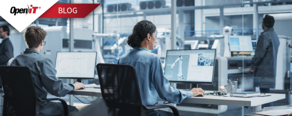 Engineers working on CAD software in a modern manufacturing lab, illustrating Open iT’s insights on software licensing models for optimizing engineering software usage and cost efficiency.