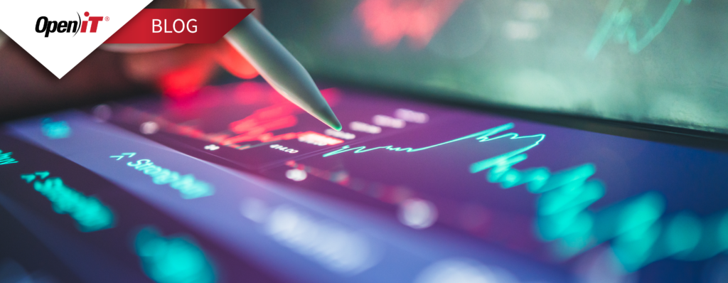 Digital analyst reviewing interactive data charts on a touchscreen while evaluating software license trends and featureset mapping using Open iT tools.