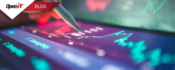Digital analyst reviewing interactive data charts on a touchscreen while evaluating software license trends and featureset mapping using Open iT tools.