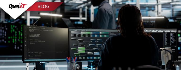 Open iT engineer using StorageAnalyzer to review file systems and storage capacity planning data on multiple monitors, supporting data lifecycle management and enterprise storage management tasks.